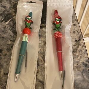 Handcrafted Grinch pens